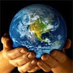 Hand holding a globe